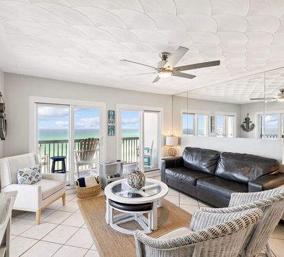Cozy Living Area Offering Ample Seating & Wall to Wall Gulf Views