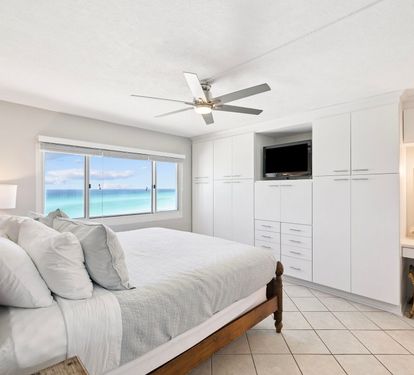 Primary King Suite - Ample Storage + Flat-Screen TV