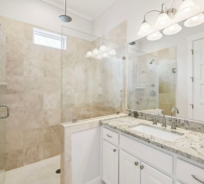 Primary King En-Suite - Single Vanity + Walk-In Shower