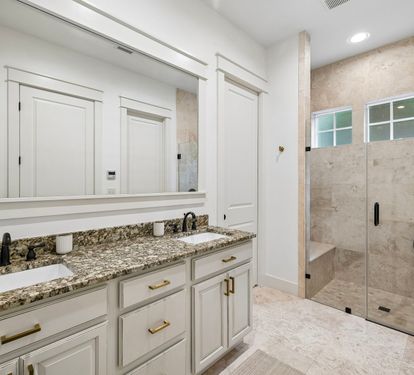 Primary King En-Suite - Dual Vanities + Walk-In Shower