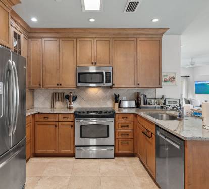 Spacious, fully equipped kitchen inside Sandestin Golf & Beach Resort-perfect for golfers preparing meals before tee time or relaxing after a day on the course.