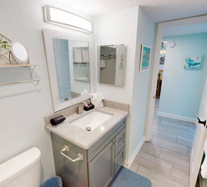 Fresh and bright bathroom with modern fixtures, premium toiletries, and fluffy towels ready for your refreshing morning routine.