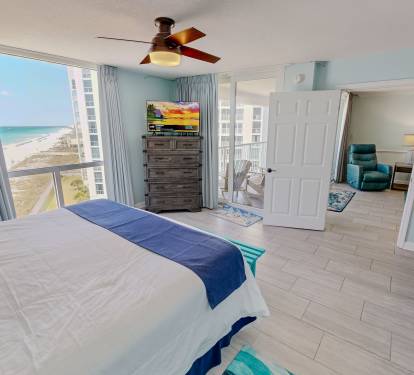 Wake up to stunning ocean views in your serene bedroom, where coastal breezes and soft morning light create the perfect start to your beach getaway.