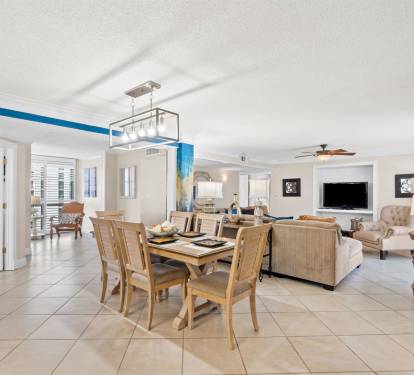 Step into your bright, open living space where coastal elegance meets comfort—perfect for gathering with loved ones.