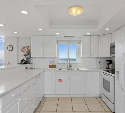 Cook with ocean breezes flowing through your bright, fully-equipped kitchen while gazing at endless sea views through the window.