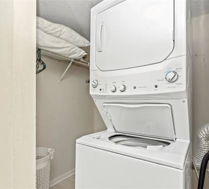 Your private laundry closet features a convenient washer-dryer combo, letting you pack light and keep your clothes fresh throughout your stay.