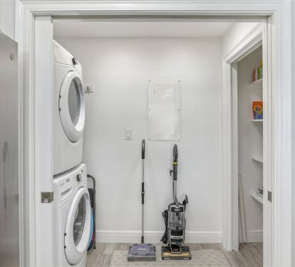 Your private laundry room keeps your stay comfortable with full-size washer and dryer, plus storage for all your cleaning needs.