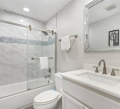 Refresh in your marble-appointed bathroom featuring elegant finishes, modern fixtures, and thoughtful touches for your comfort.