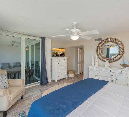 Unwind in your coastal-inspired bedroom with ocean breezes from your private balcony and crisp linens for perfect rest.