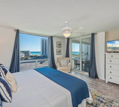Your master bedroom offers stunning ocean views from your private balcony, where you'll wake to blue waters and coastal breezes every morning.