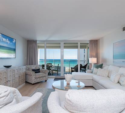 Relax in your oceanfront living room with stunning sea views through floor-to-ceiling windows and your private balcony awaiting.