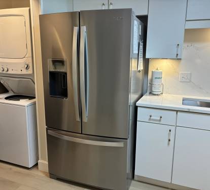 Your modern kitchen features stainless steel appliances and in-unit washer and dryer for ultimate convenience during your stay.