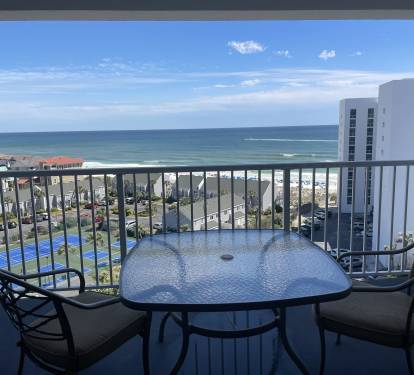 Savor morning coffee at your private table while watching waves dance beyond the coastline.