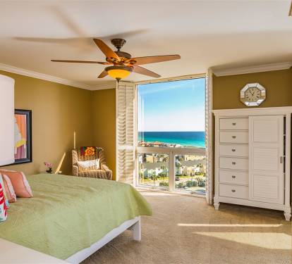 Wake up to stunning ocean views from your comfortable bedroom with tropical breezes from the ceiling fan.