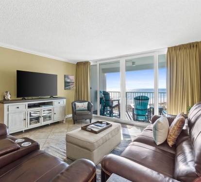 Sink into plush leather seating while enjoying breathtaking ocean views from your private balcony through floor-to-ceiling windows.