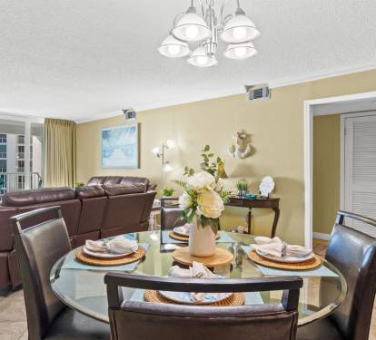 Relax in your spacious living and dining area with stunning ocean views from your private balcony.