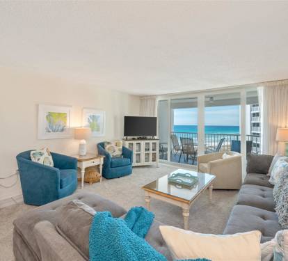 Sink into plush seating while ocean waves fill your view through floor-to-ceiling windows on your private balcony.