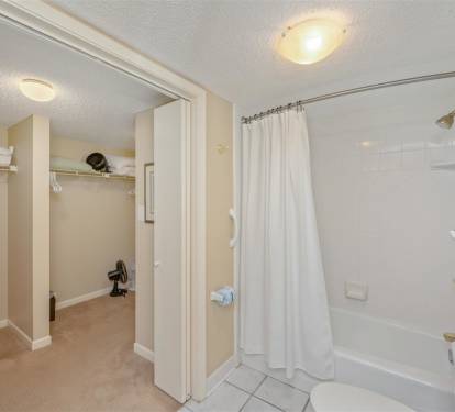 Step into your private bathroom featuring a spacious tub-shower combo and convenient walk-in closet for all your belongings.