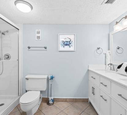 Step into your serene bathroom retreat with a refreshing walk-in shower, modern vanity, and coastal touches that make every morning feel like vacation.