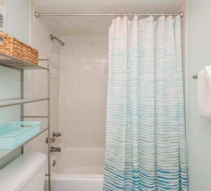 Refresh in your private bathroom with thoughtful storage and fluffy towels ready for your stay.