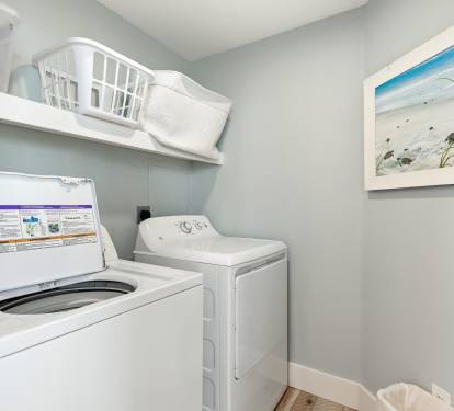 Your private laundry room keeps you comfortable with full-size washer and dryer, plus organized storage for all your vacation essentials.