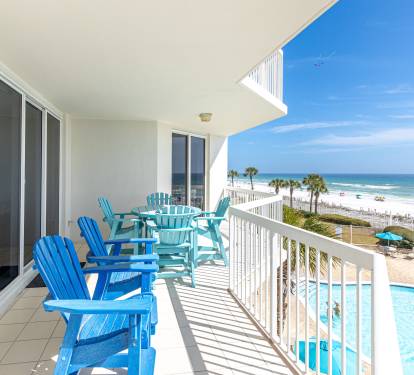 Soak up endless ocean views from your private balcony, where colorful beach chairs await your morning coffee and sunset cocktails.