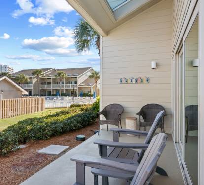 Relax on the private patio with comfortable seating and peaceful coastal surroundings — the perfect spot for morning coffee or winding down after a beach day.
