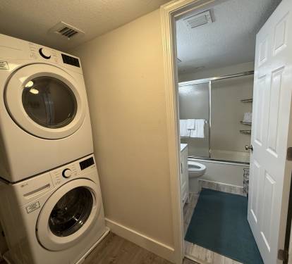 Your private laundry area keeps travel light with full-size washer and dryer, plus convenient bathroom access.