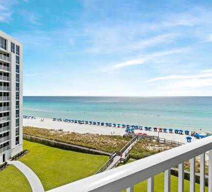 Wake up to stunning ocean views from your private balcony overlooking pristine white sand and crystal-clear waters.