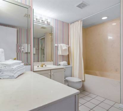 Refresh in your spacious bathroom with ample counter space, fluffy towels, and a full tub-shower combo.