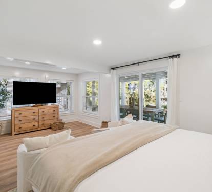 Primary King Suite - Flat-Screen TV + Patio Access