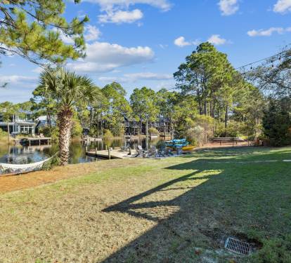 Take Advantage of the Expansive Back Yard, Hammock & Private Dock!