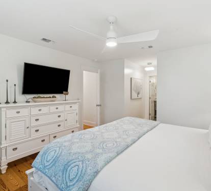 Primary King Suite - Equipped with a Flat-Screen TV