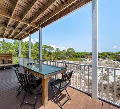 Salty Seashell 1st Level Balcony Outdoor Dining Seats 4