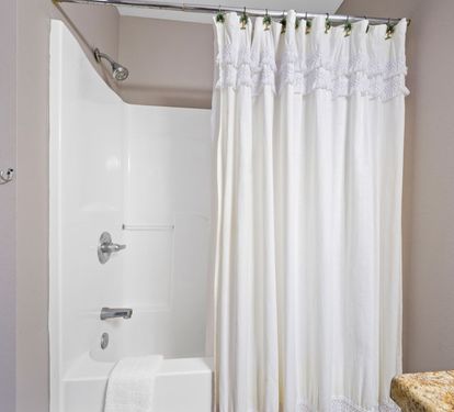 Salty Seashell Primary Ensuite Bathroom with Tub Shower Combo (2nd Level)