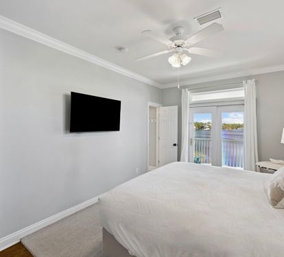 King Guest Suite - Balcony Access + Flat-Screen TV