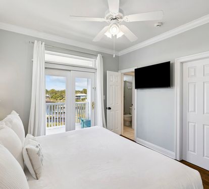 King Guest Suite - Balcony Access + Flat-Screen TV
