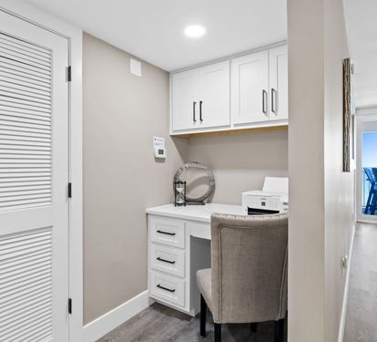 Your own dedicated workspace awaits, complete with built-in desk and ocean glimpses to inspire productivity during your stay.
