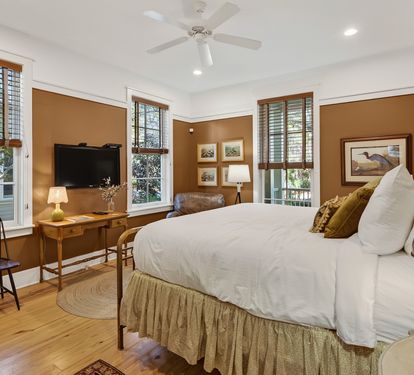Unwind in your cozy bedroom with warm earth tones, crisp linens, and charming touches that create the perfect retreat.