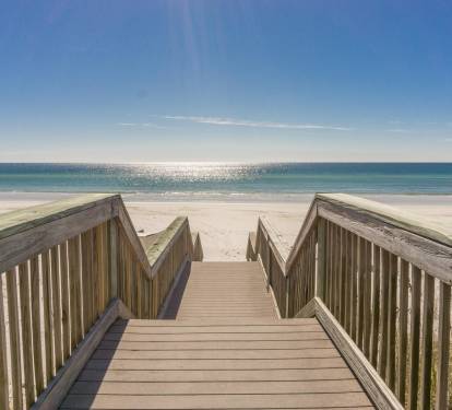 A quick walk and your toes will be in the sand 