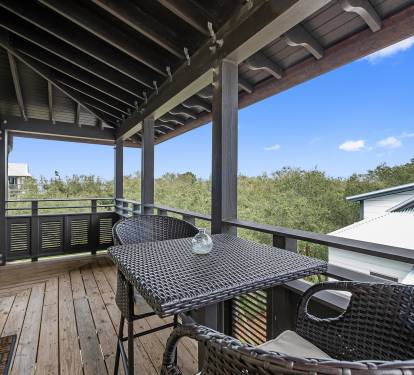 Private Balcony with Table and Chairs