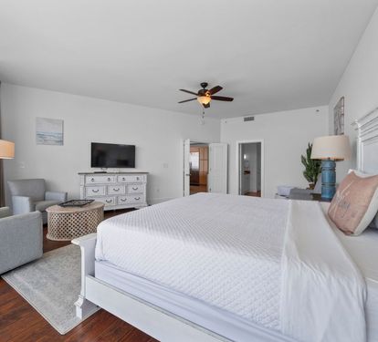Caribe Penthouse C1 Primary Bedroom with King Bed and Sitting Area