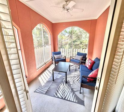 Enjoy a favorite beverage on the upstairs lanai