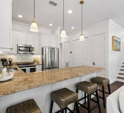 Ample Counter Space + Bar Seating for 4