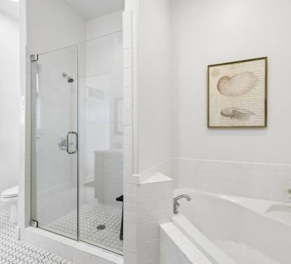 Primary King En-Suite - Soaking Tub + Walk-In Shower
