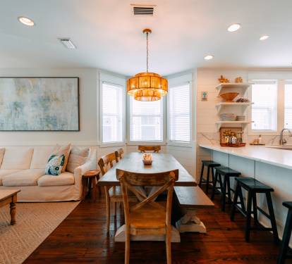 Kitchen and den area connect with plenty of room for your large group