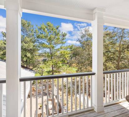 2nd floor balcony for master suite #2- overlooks the beautiful green space.