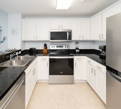 Kitchen with new stainless steel appliances