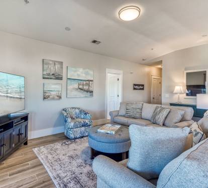 Cozy Up for a Movie Night in the Beachy Living Space