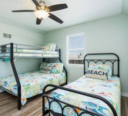 Blue Lagoon Bedroom 3 with Twin + Twin-over-Full Bunk Bed